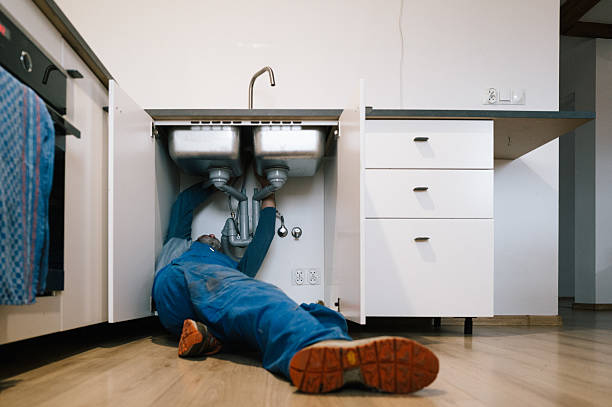 Professional Emergency Plumber technician working in Winterville, GA
